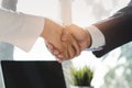 Close up view Hands of businessman and client shaking hands after agree deal Royalty Free Stock Photo