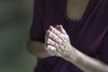 Close up view of hands clasped in prayer Royalty Free Stock Photo