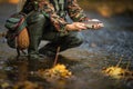 Close-up view of the hands of a fly fisherman holding a lovely trout Royalty Free Stock Photo