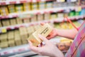 Close up view of hands holding butter