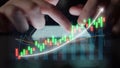 Hands Engaging with Interactive Stock Market Graphs and Data Visualizations on Digital Screen for Investment Analysis Royalty Free Stock Photo