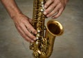Hands playing saxophone Royalty Free Stock Photo