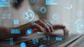 Modern Technology Interface with Hands Typing on Keyboard Surrounded by Futuristic Digital Data and Graphical Elements Royalty Free Stock Photo