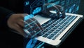 Hands Typing on Laptop with Supply Chain Management Graphics and AI Icons Highlighting Warehouse Operations and Data Royalty Free Stock Photo