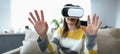 Close-up view of happy young woman using virtual reality headset Royalty Free Stock Photo