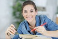 close up view hardworking woman holding ruler and pencil Royalty Free Stock Photo