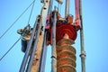 Close-up view of a heavy-duty construction drill rig with auger bit, used for deep foundation piling or ground boring Royalty Free Stock Photo