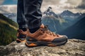 Close up view of hiker outdoors walking with durable hiking shoes in natural environment