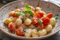 Close up view of homemade gnocchi with tomatoe and parmesan