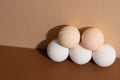 Close-up view of the homemade organic bath bombs with shadow on beige background. Spa concept. Presents for body Royalty Free Stock Photo