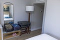 Close-up view of hotel room interior with neatly folded clothing on suitcases. Miami Beach. USA Royalty Free Stock Photo