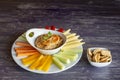 Hummus with vegetable snacks