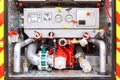 Detailed view of fire truck\'s hydraulic control panel, levers and gauges in emergency vehicle, focus on operation concept Royalty Free Stock Photo