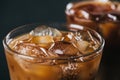 close up view of ice cubes in cold brewed coffee in glass on dark background Royalty Free Stock Photo