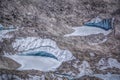 Close up view of ice and stones on Khumbu Glacier.