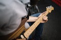 Close-up view if male musician playing electric guitar Royalty Free Stock Photo