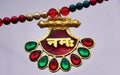 Indian woman Jewelry necklace with Hindu mantra in hindi languge meddalion Royalty Free Stock Photo