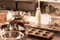 close up view of ingredients for dough and kitchen utensils on counter in restaurant Royalty Free Stock Photo