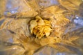 Close-up view inside of a big silver bag of potato chips with selective focus Royalty Free Stock Photo