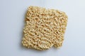 A close up view of a instant noodle cubes and white background Royalty Free Stock Photo