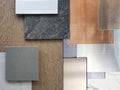 close up view of interior material samples including wood veneer, ceramic tiles, multi color of aluminium metallics, travertine