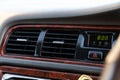 A close-up view of the interior of a modern luxury car with a ventilation deflector for heating and cooling the passenger Royalty Free Stock Photo