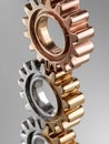 Close-Up View of Interlocking Metallic Gears in Various Finishes Highlighting Precision Engineering and Industrial Design Elements Royalty Free Stock Photo
