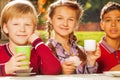 Close up view of international kids drinking tea Royalty Free Stock Photo