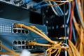 Close up view of internet equipment and cables in the server room Royalty Free Stock Photo