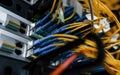 Close up view of internet equipment and cables in the server room Royalty Free Stock Photo