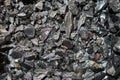 Close up view of the iron ore. rough Hematite, iron Kidney Ore stone. Pieces of ferrotitanium closeup. Close-up view of the iron Royalty Free Stock Photo