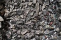 Close up view of the iron ore. rough Hematite, iron Kidney Ore stone. Pieces of ferrotitanium closeup. Close-up view of the iron Royalty Free Stock Photo