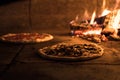 close up view of italian pizza baking in brick oven