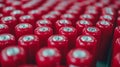 Close-up view of a large array of red cylindrical batteries aligned in rows, emphasizing energy storage and technology Royalty Free Stock Photo