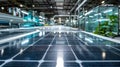 Close-up view of a large solar panel array inside a modern manufacturing facility highlighting renewable energy technology in an Royalty Free Stock Photo