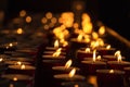 The view of lighted tealight candles. Burning candles