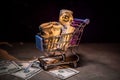 close up view of little shopping trolley full of coins on brown.Gold coins in shopping online cart isolated on brown back Royalty Free Stock Photo