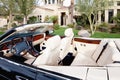 Close-up view of luxury car interior with white leather seats Royalty Free Stock Photo