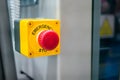 Close up view: machine control panel with red switch button - emergency stop Royalty Free Stock Photo