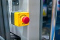 Close up view: machine control panel with red switch button - emergency stop Royalty Free Stock Photo