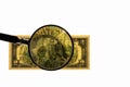 Close up view of magnifying glass over two dollar bill. Banknote. Royalty Free Stock Photo