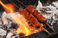 View of making mutton kababs or kebabs on coal fired arrangement Royalty Free Stock Photo