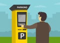 Close-up view of male driver paying for parking. Parking zone with payment system. Back view.