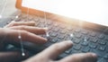 Close-up view of male hands typing on electronic tablet keyboard-dock station. Businessman working at office and using Royalty Free Stock Photo