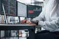 Close up view. Male stockbroker in formal clothes works in the office with financial market Royalty Free Stock Photo