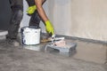 Close up view of male worker carrying out painting work. Royalty Free Stock Photo