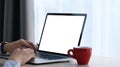 Close up view of man hands working on laptop computer at his workplace. Royalty Free Stock Photo