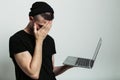 Close up view of man with laptop and facepalm. Royalty Free Stock Photo