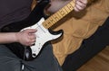 Close up view of man playing guitar Royalty Free Stock Photo