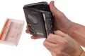 Close-up view of man`s hand holding SONY wolkman portable cassette tape player.